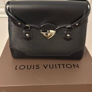 Louis Vuitton EPI GM bag.  Classic black